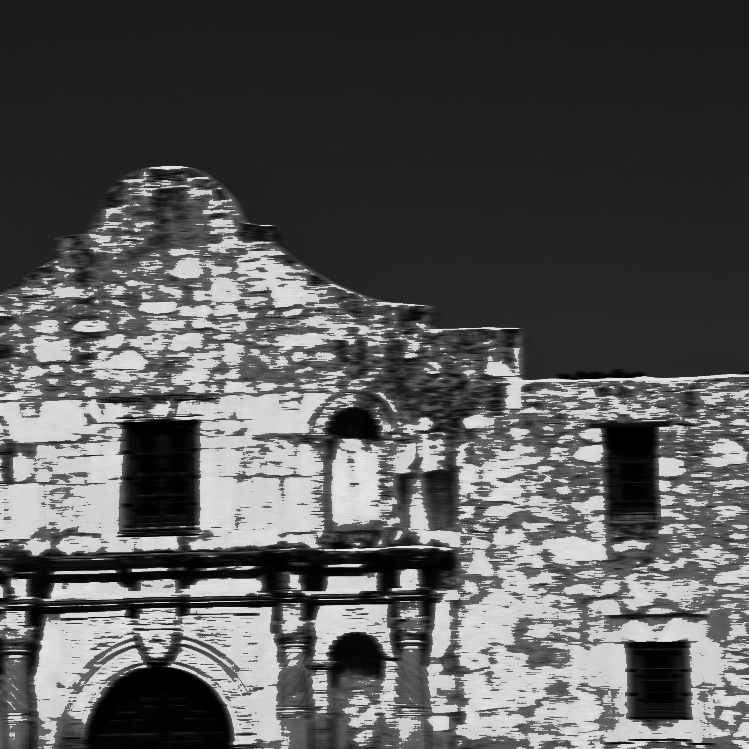 Distorted image of the alamo in black and white